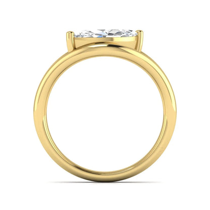 Marquise cut lab grown diamond open frame solitaire engagement ring in a yellow gold sculptural setting