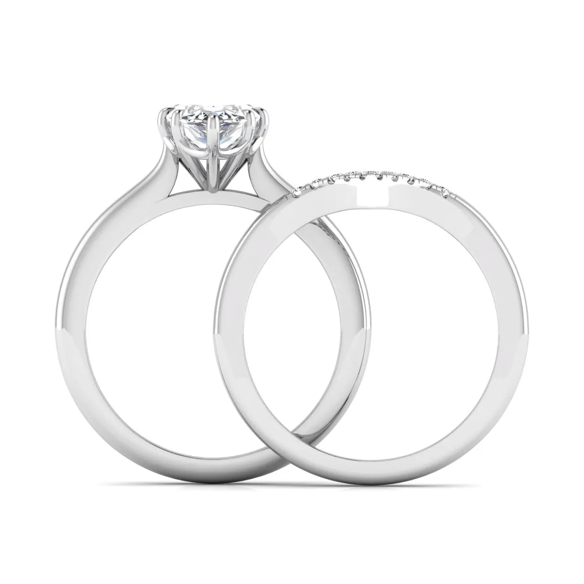 Marquise cut lab grown diamond bypass engagement ring with round side diamonds in a prong setting and white gold tone band.