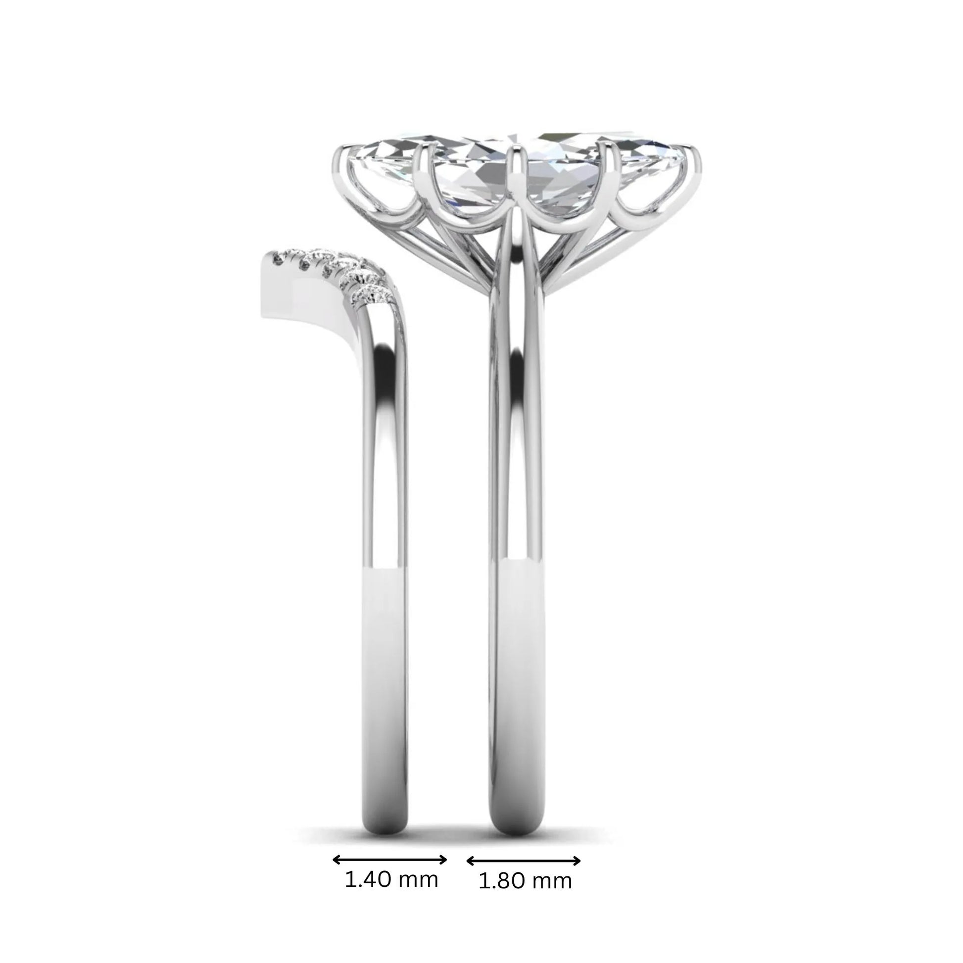 Marquise cut lab grown diamond bypass engagement ring with round side diamonds in a prong setting and white gold tone band.