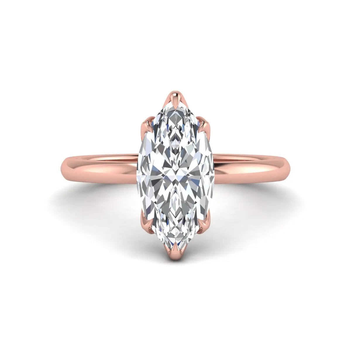 Marquise cut lab grown diamond solitaire engagement ring with six prong setting in rose gold tone featuring an elongated elegant design.