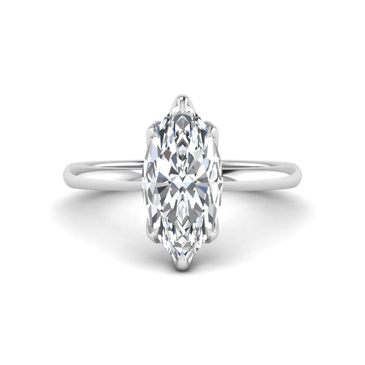 Marquise cut lab grown diamond solitaire engagement ring with six prong setting in white gold tone featuring an elongated elegant design.