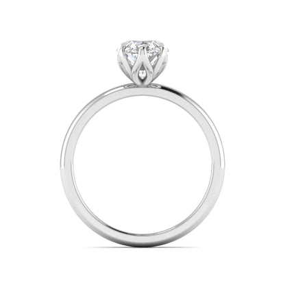 Marquise cut lab grown diamond solitaire engagement ring with six prong setting in white gold tone featuring an elongated elegant design.