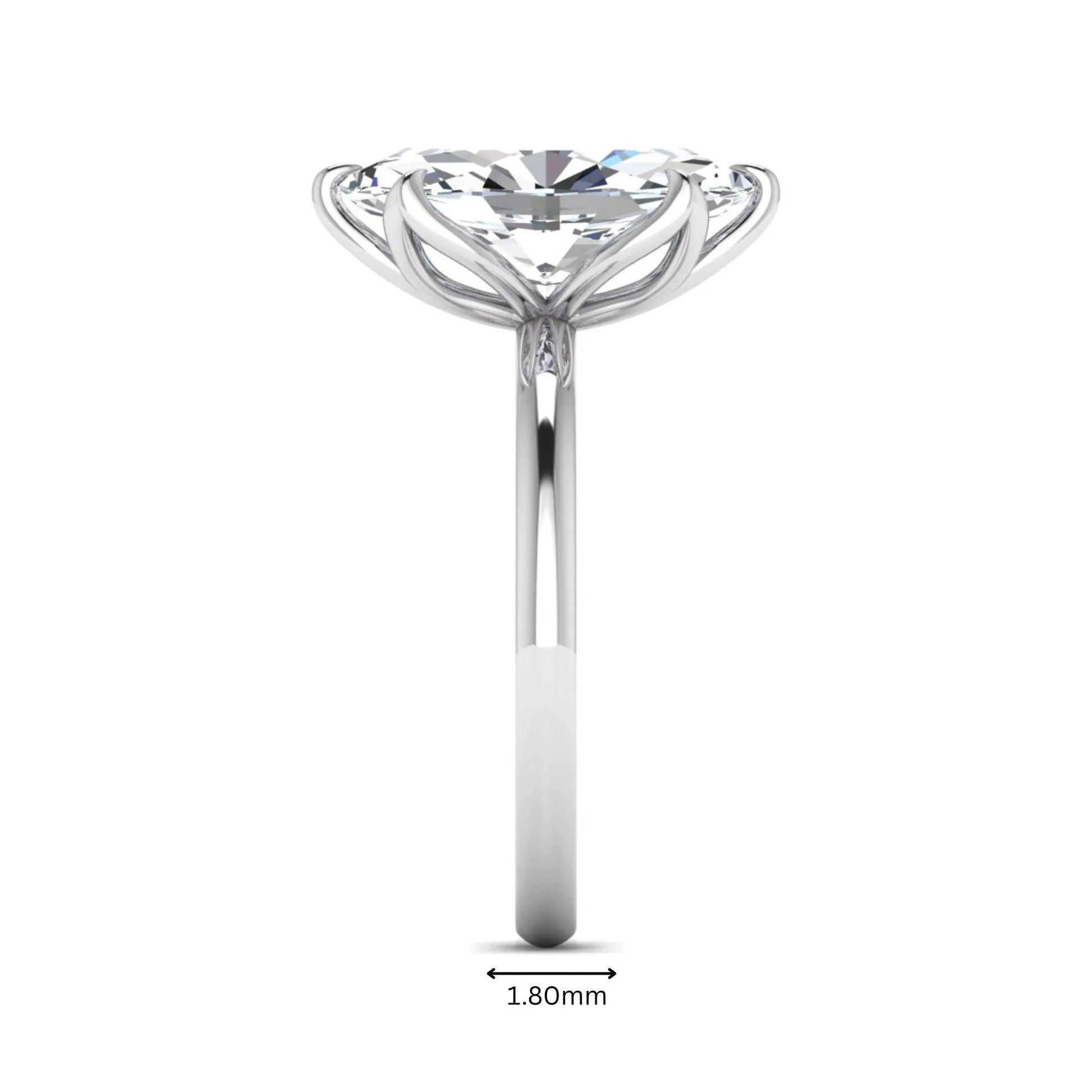 Marquise cut lab grown diamond solitaire engagement ring with six prong setting in white gold tone featuring an elongated elegant design.
