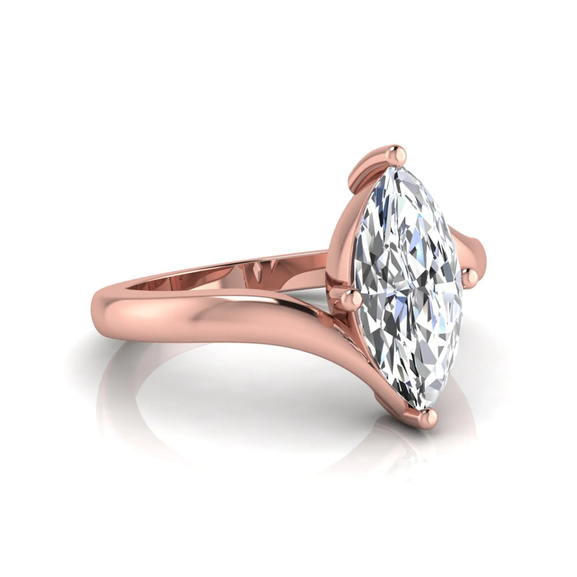 Marquise cut lab grown diamond solitaire engagement ring featuring a four-prong setting with an elegant bypass-style band in rose gold finish.