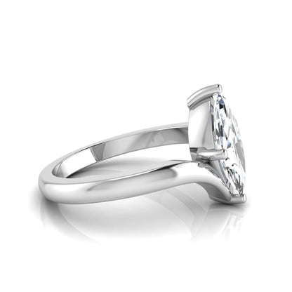Marquise cut lab grown diamond solitaire engagement ring featuring a four-prong setting with an elegant bypass-style band in white gold finish.