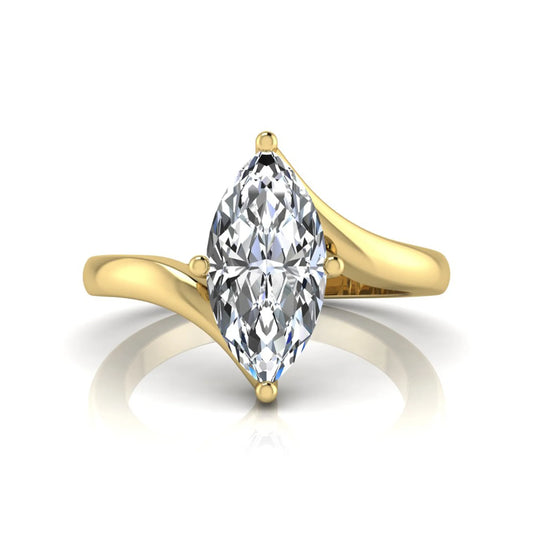 Marquise cut lab grown diamond solitaire engagement ring featuring a four-prong setting with an elegant bypass-style band in yellow gold finish.
