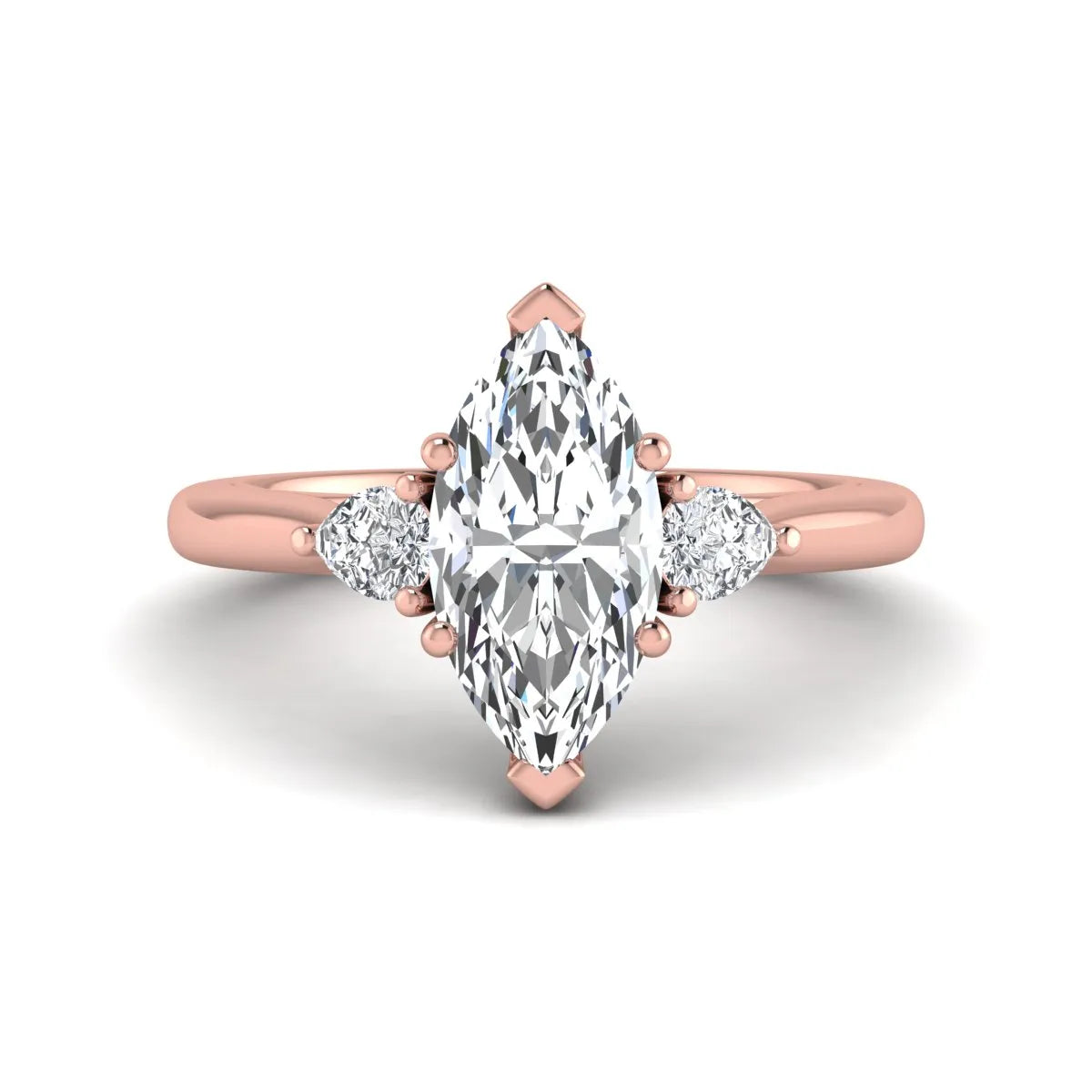 Marquise cut lab grown diamond three stone engagement ring with prong setting, round and pear side diamonds, rose gold tone shown for design reference.