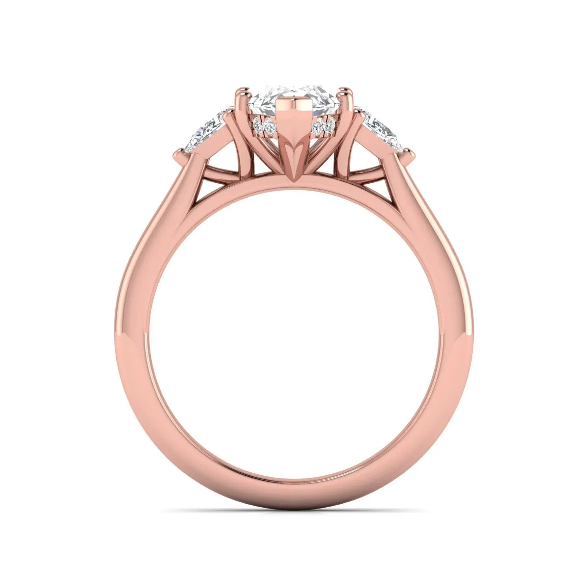 Marquise cut lab grown diamond three stone engagement ring with prong setting, round and pear side diamonds, rose gold tone shown for design reference.