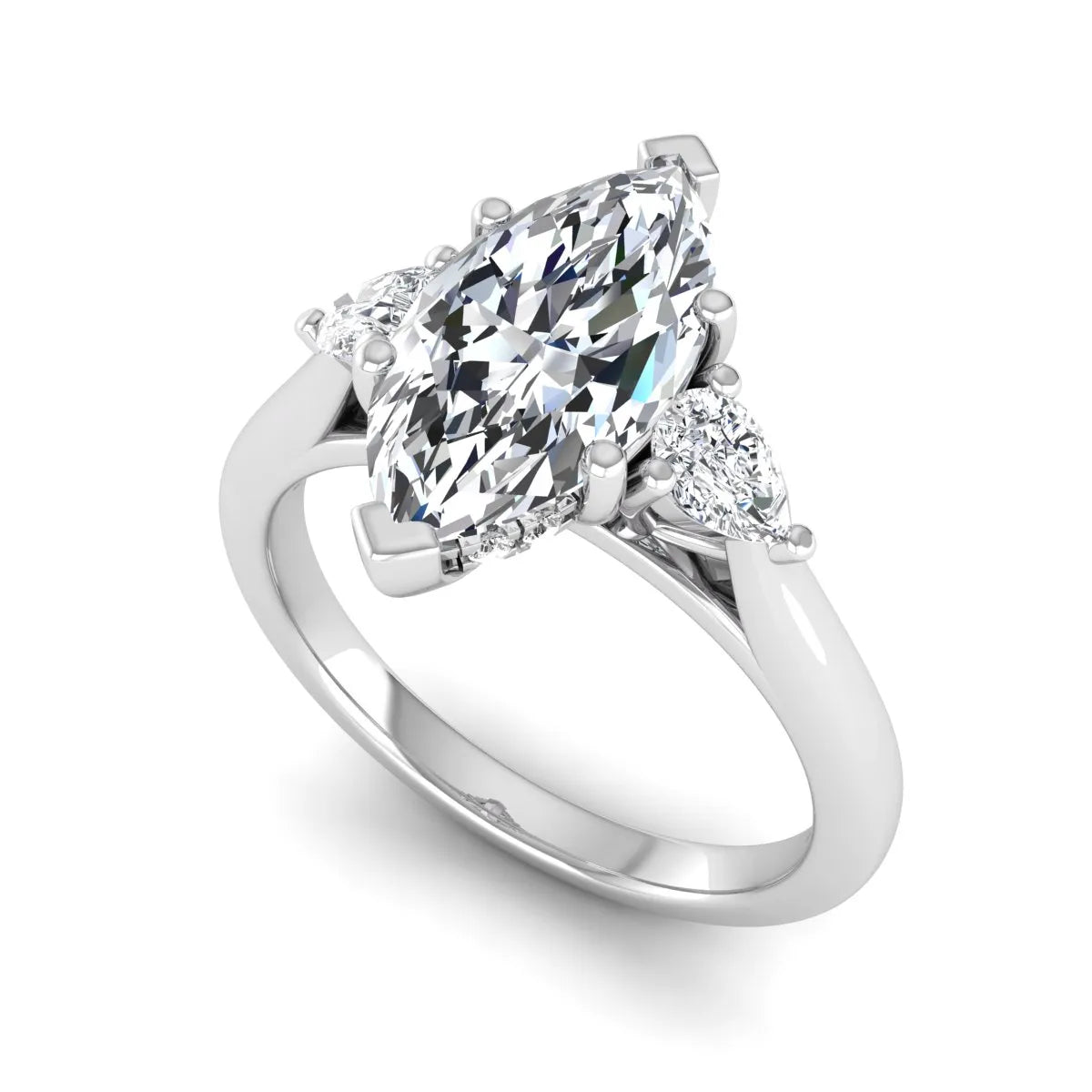 Marquise cut lab grown diamond three stone engagement ring with prong setting, round and pear side diamonds, white gold tone shown for design reference.