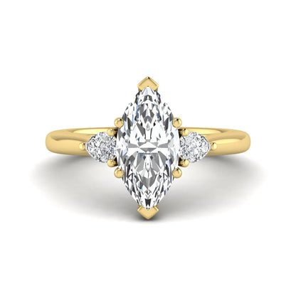 Marquise cut lab grown diamond three stone engagement ring with prong setting, round and pear side diamonds, yellow gold tone shown for design reference.