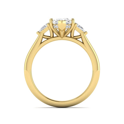Marquise cut lab grown diamond three stone engagement ring with prong setting, round and pear side diamonds, yellow gold tone shown for design reference.