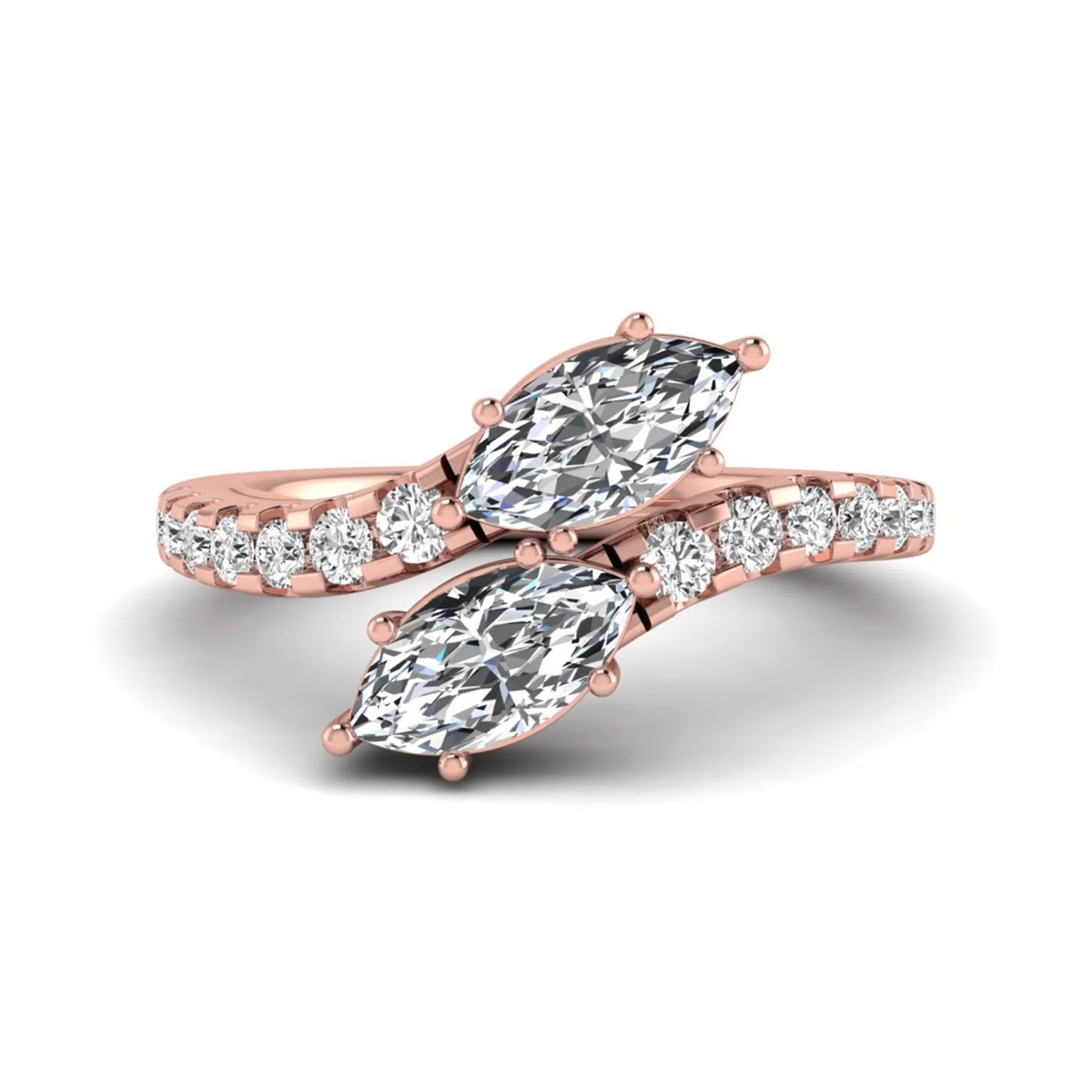 Marquise and round cut lab grown diamond bypass ring with prong setting in rose gold tone.