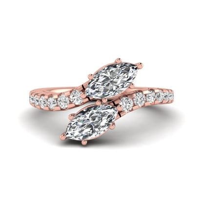 Marquise and round cut lab grown diamond bypass ring with prong setting in rose gold tone.