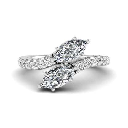 Marquise and round cut lab grown diamond bypass ring with prong setting in white gold tone.