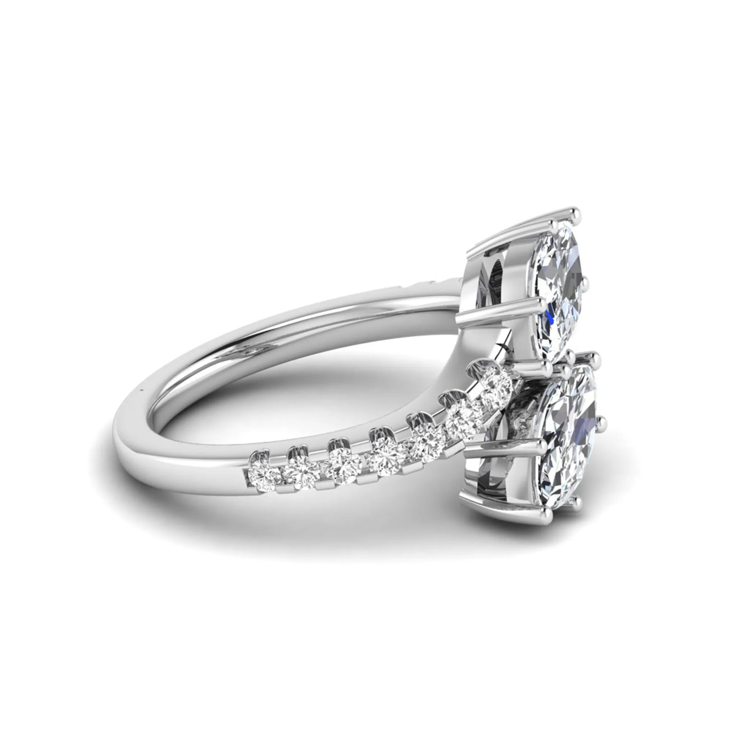 Marquise and round cut lab grown diamond bypass ring with prong setting in white gold tone.