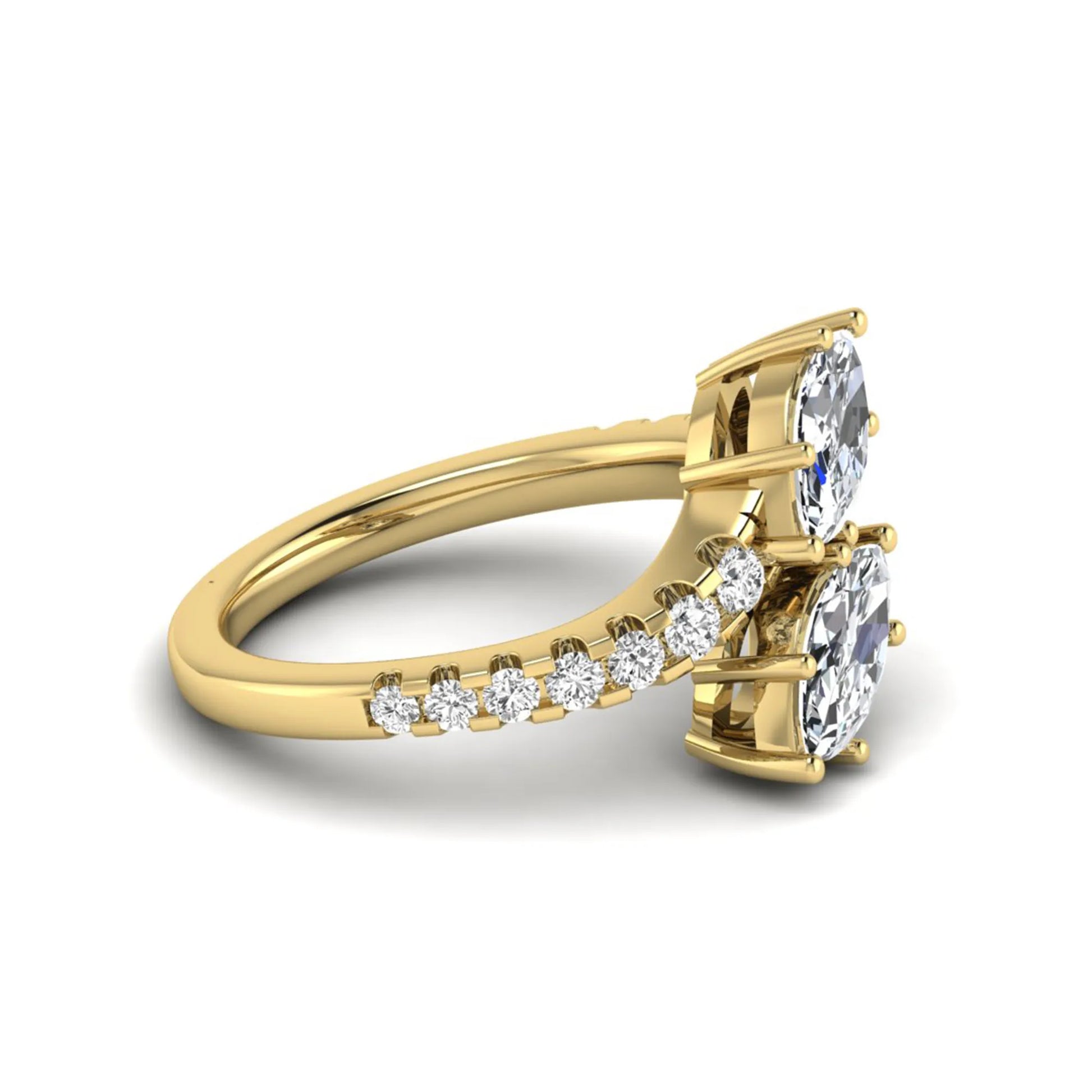 Marquise and round cut lab grown diamond bypass ring with prong setting in yellow gold tone.