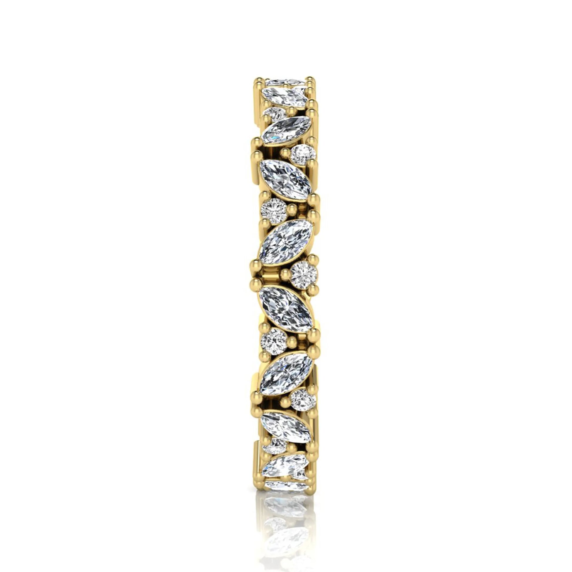 Marquise and round lab grown diamond eternity ring featuring alternating diamonds in a shared prong setting with a timeless full eternity design in yellow gold