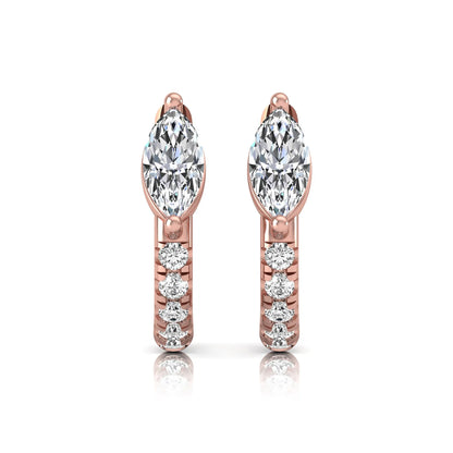Marquise and round lab grown diamond pavé huggie hoop earrings featuring a vertical two prong marquise center diamond with graduated round pavé diamond accents in rose gold.