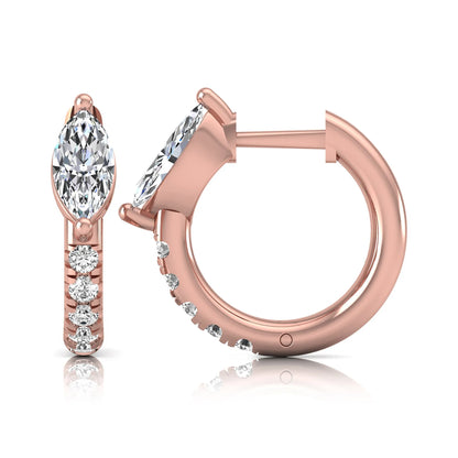 Marquise and round lab grown diamond pavé huggie hoop earrings featuring a vertical two prong marquise center diamond with graduated round pavé diamond accents in rose gold.