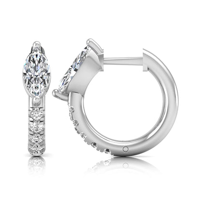 Marquise and round lab grown diamond pavé huggie hoop earrings featuring a vertical two prong marquise center diamond with graduated round pavé diamond accents in white gold.