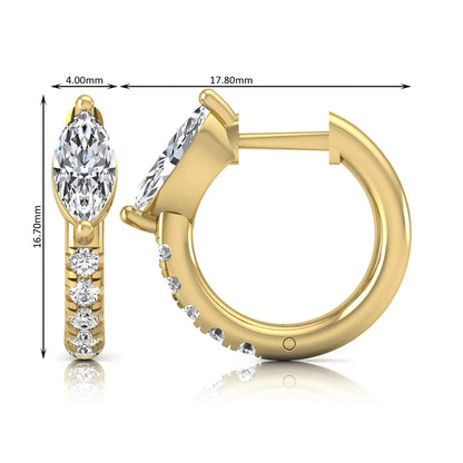 Marquise and round lab grown diamond pavé huggie hoop earrings featuring a vertical two prong marquise center diamond with graduated round pavé diamond accents in yellow gold.