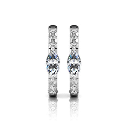 Marquise and round lab grown diamond pavé huggie hoop earrings featuring a vertical four prong marquise center diamond with graduated round pavé diamonds in white gold.