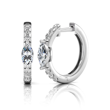 Marquise and round lab grown diamond pavé huggie hoop earrings featuring a vertical four prong marquise center diamond with graduated round pavé diamonds in white gold.