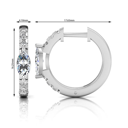 Marquise and round lab grown diamond pavé huggie hoop earrings featuring a vertical four prong marquise center diamond with graduated round pavé diamonds in white gold.