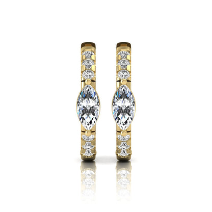 Marquise and round lab grown diamond pavé huggie hoop earrings featuring a vertical four prong marquise center diamond with graduated round pavé diamonds in yellow gold.