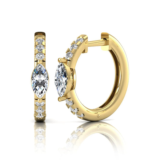 Marquise and round lab grown diamond pavé huggie hoop earrings featuring a vertical four prong marquise center diamond with graduated round pavé diamonds in yellow gold.