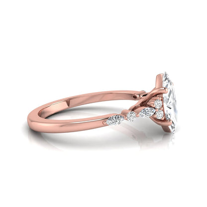 rose gold Marquise cut lab grown diamond engagement ring featuring marquise and round side diamonds in a classic prong setting