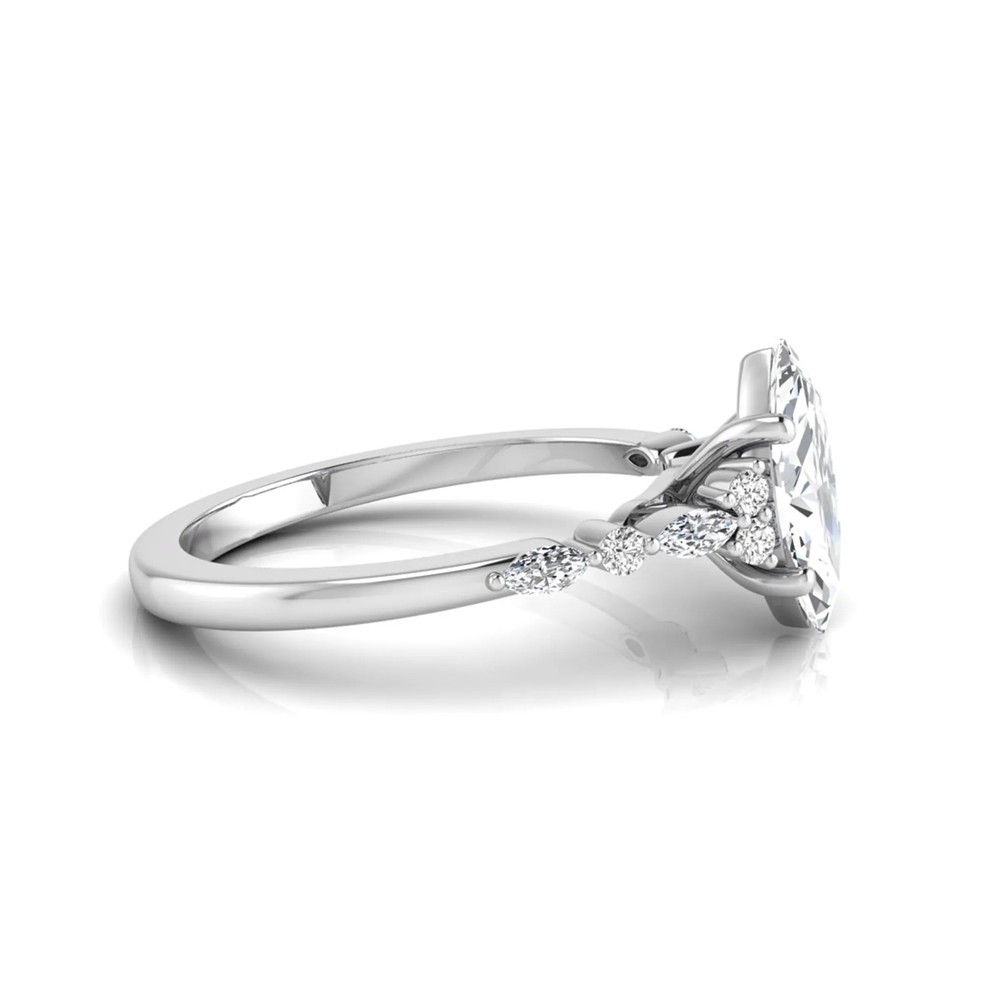 white gold Marquise cut lab grown diamond engagement ring featuring marquise and round side diamonds in a classic prong setting