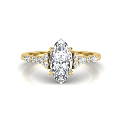 yellow gold Marquise cut lab grown diamond engagement ring featuring marquise and round side diamonds in a classic prong setting