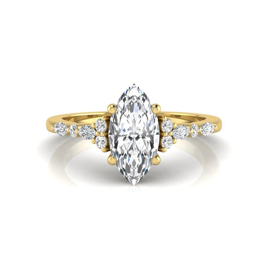 yellow gold Marquise cut lab grown diamond engagement ring featuring marquise and round side diamonds in a classic prong setting