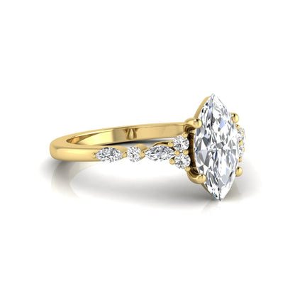 yellow gold Marquise cut lab grown diamond engagement ring featuring marquise and round side diamonds in a classic prong setting