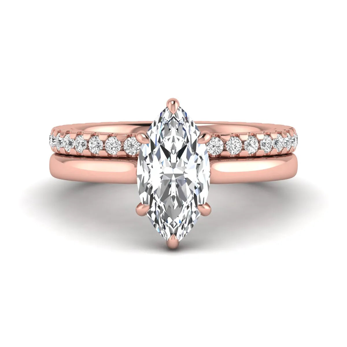 Marquise cut lab grown diamond bridal ring set featuring a six prong solitaire engagement ring with a matching round diamond eternity wedding band in rose gold tone.