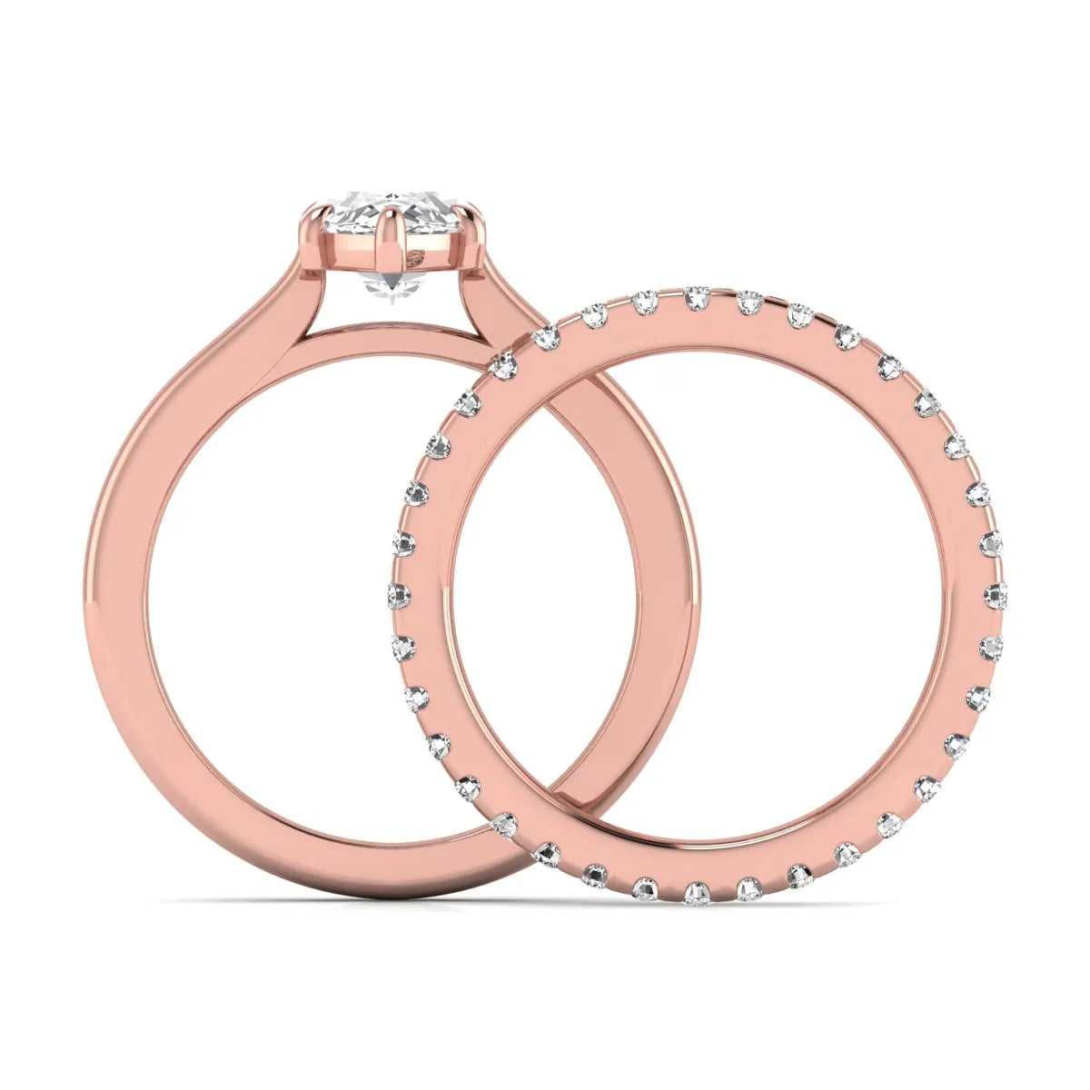 Marquise cut lab grown diamond bridal ring set featuring a six prong solitaire engagement ring with a matching round diamond eternity wedding band in rose gold tone.