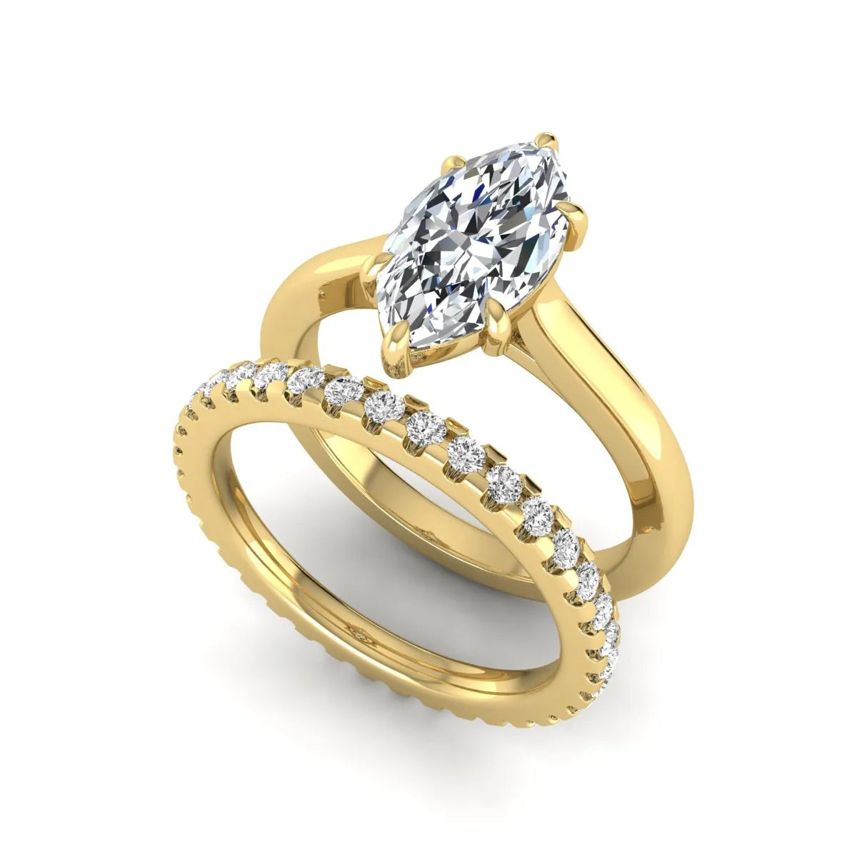 Marquise cut lab grown diamond bridal ring set featuring a six prong solitaire engagement ring with a matching round diamond eternity wedding band in yellow gold tone.