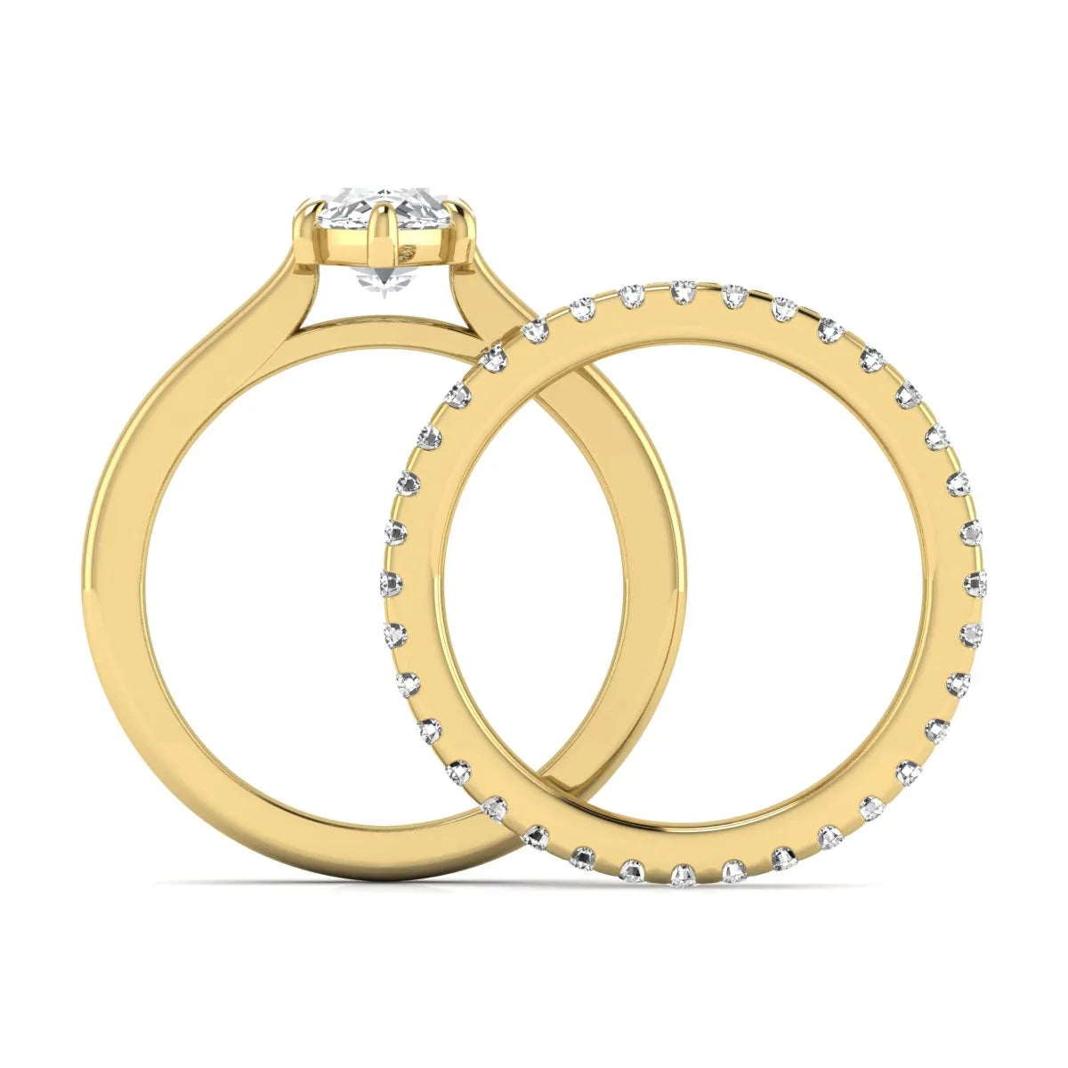 Marquise cut lab grown diamond bridal ring set featuring a six prong solitaire engagement ring with a matching round diamond eternity wedding band in yellow gold tone.