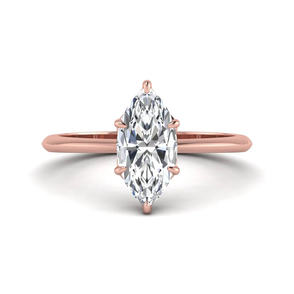Marquise cut lab grown diamond solitaire engagement ring featuring a six prong basket setting with a polished 2 mm band in rose gold tone.