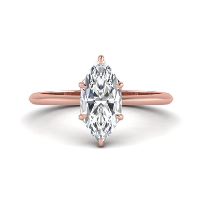 Marquise cut lab grown diamond solitaire engagement ring featuring a six prong basket setting with a polished 2 mm band in rose gold tone.