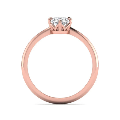 Marquise cut lab grown diamond solitaire engagement ring featuring a six prong basket setting with a polished 2 mm band in rose gold tone.