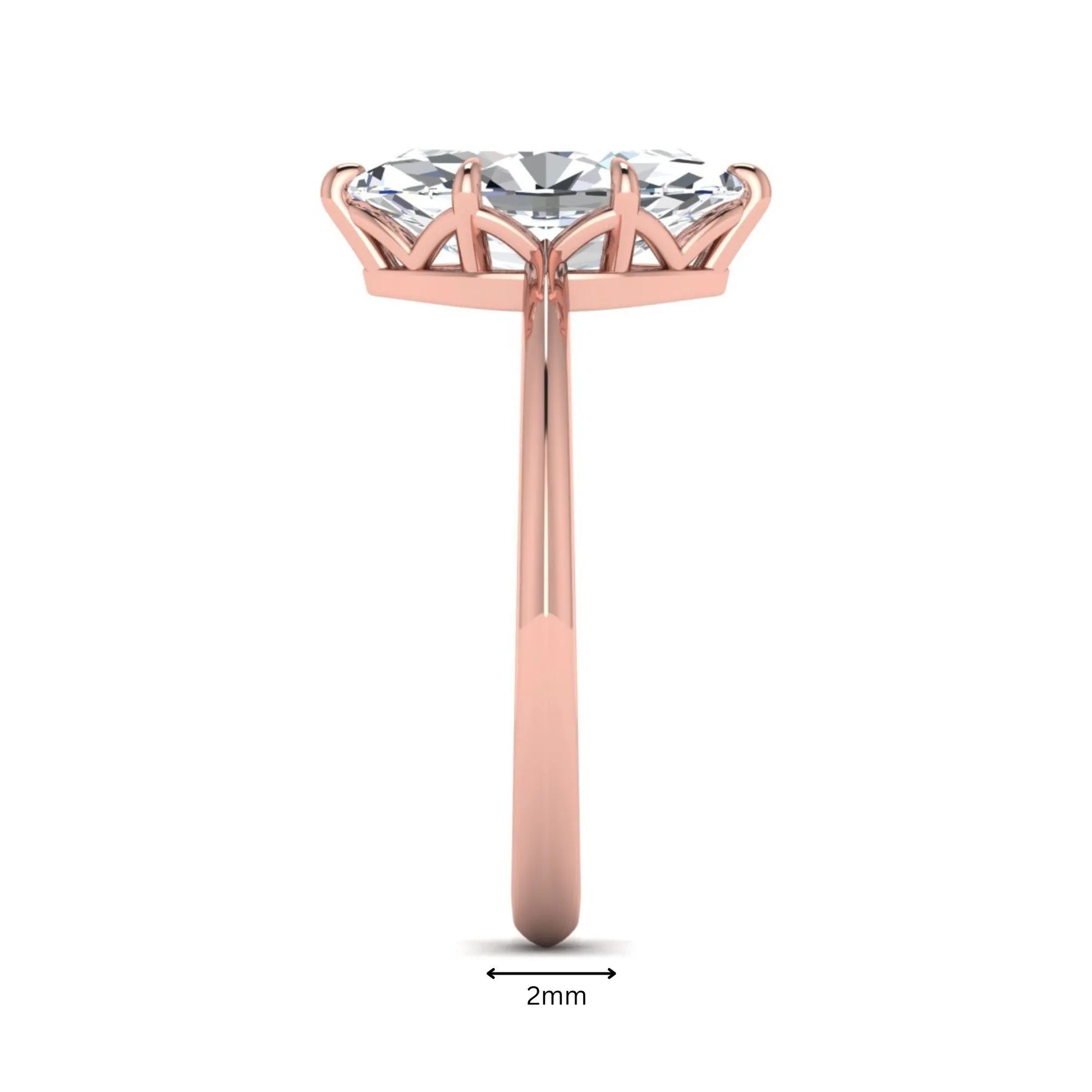 Marquise cut lab grown diamond solitaire engagement ring featuring a six prong basket setting with a polished 2 mm band in rose gold tone.