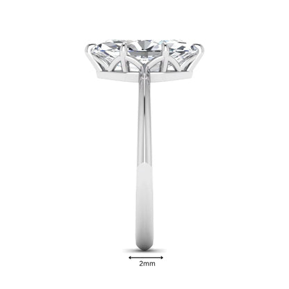 Marquise cut lab grown diamond solitaire engagement ring featuring a six prong basket setting with a polished 2 mm band in white gold tone.