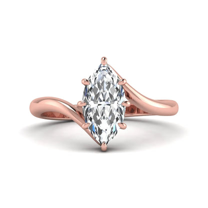 Marquise cut lab grown diamond solitaire engagement ring featuring a graceful bypass band with a six-prong setting in a polished rose gold tone.