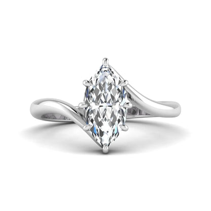 Marquise cut lab grown diamond solitaire engagement ring featuring a graceful bypass band with a six-prong setting in a polished white gold tone.