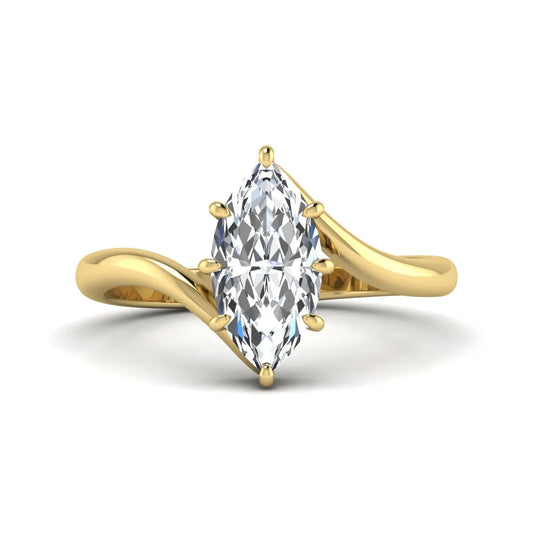 Marquise cut lab grown diamond solitaire engagement ring featuring a graceful bypass band with a six-prong setting in a polished yellow gold tone.