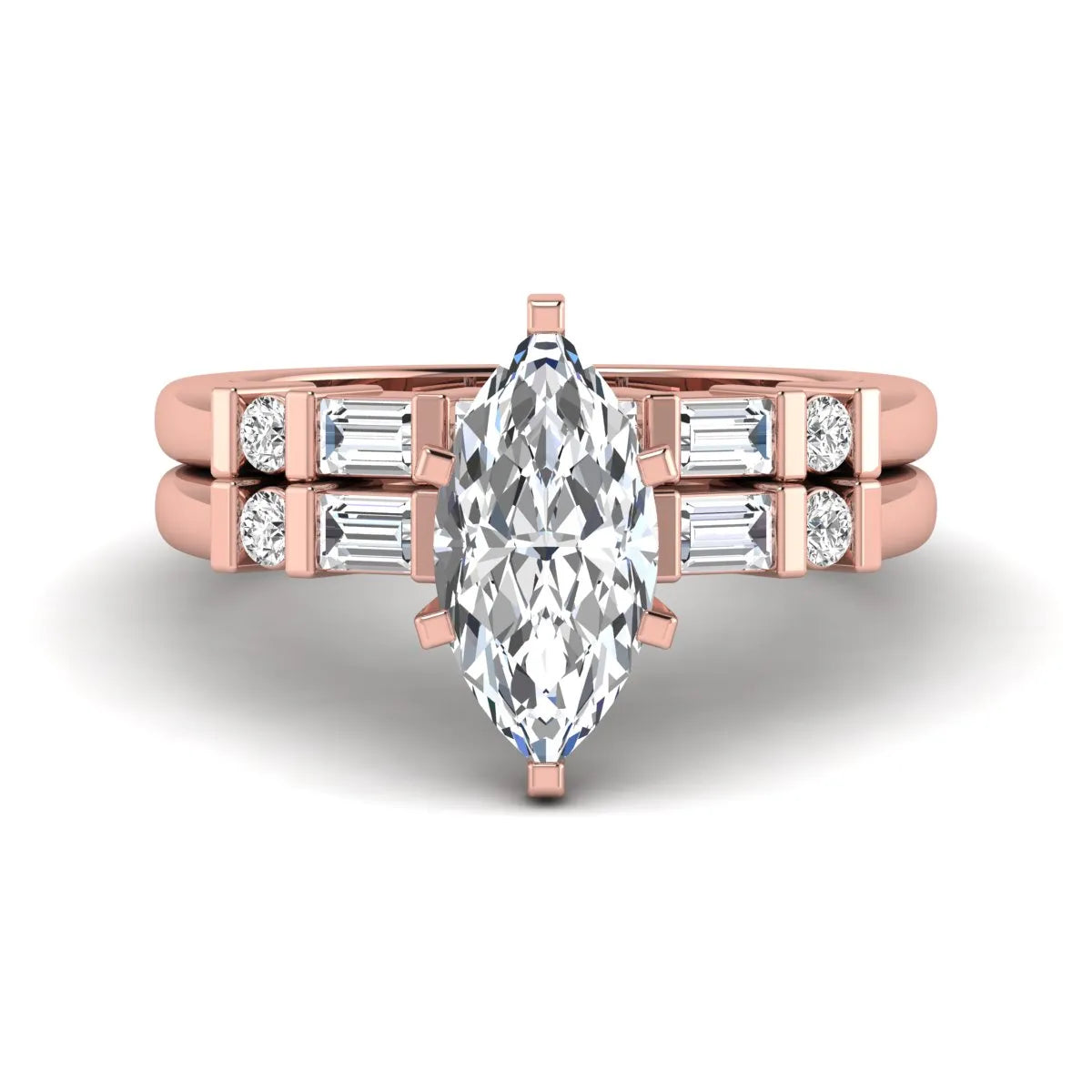 Marquise cut lab grown diamond bridal ring set featuring a six-prong solitaire engagement ring with a contour wedding band accented by baguette and round diamonds in a rose gold finish.