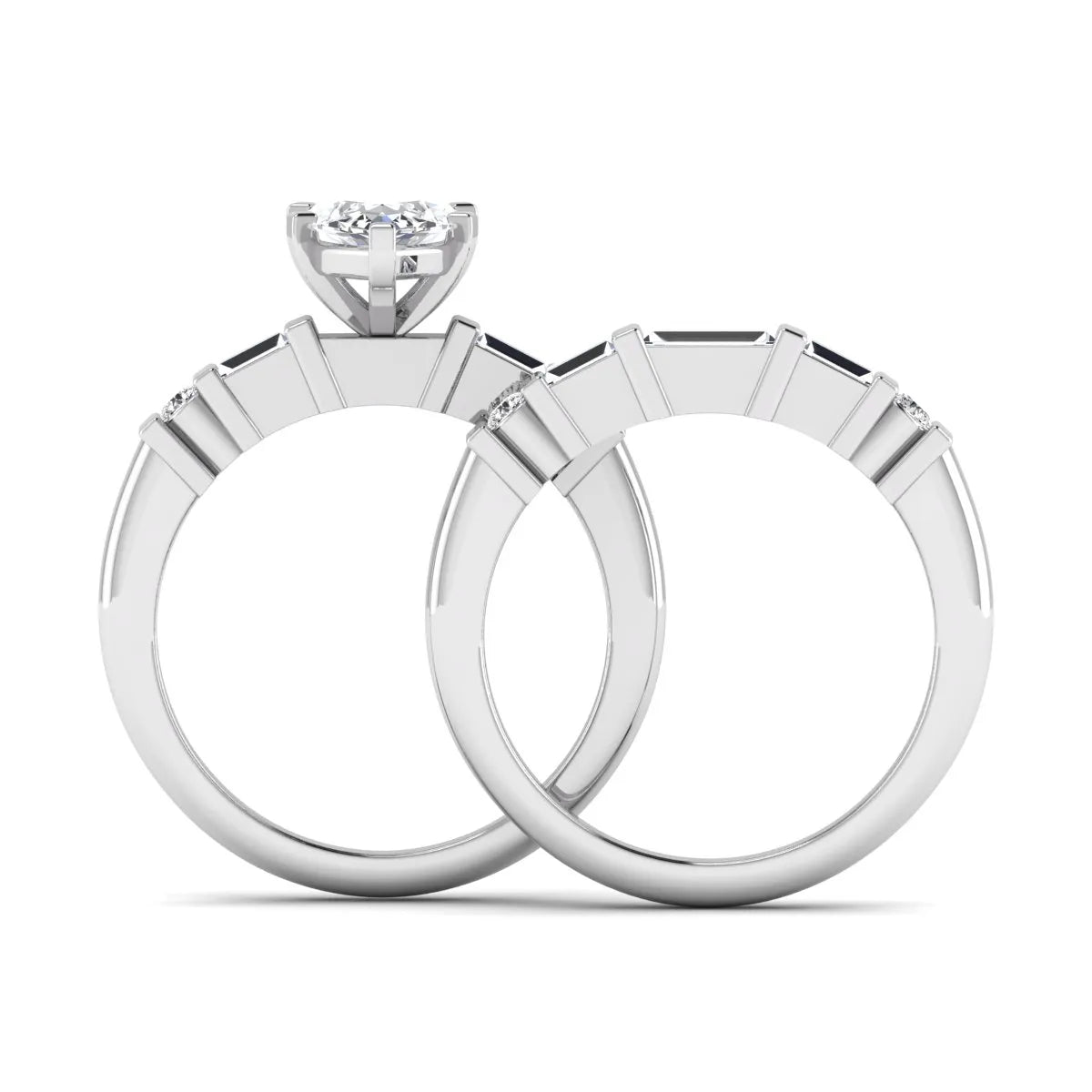 Marquise cut lab grown diamond bridal ring set featuring a six-prong solitaire engagement ring with a contour wedding band accented by baguette and round diamonds in a white gold finish.