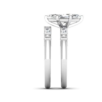 Marquise cut lab grown diamond bridal ring set featuring a six-prong solitaire engagement ring with a contour wedding band accented by baguette and round diamonds in a white gold finish.
